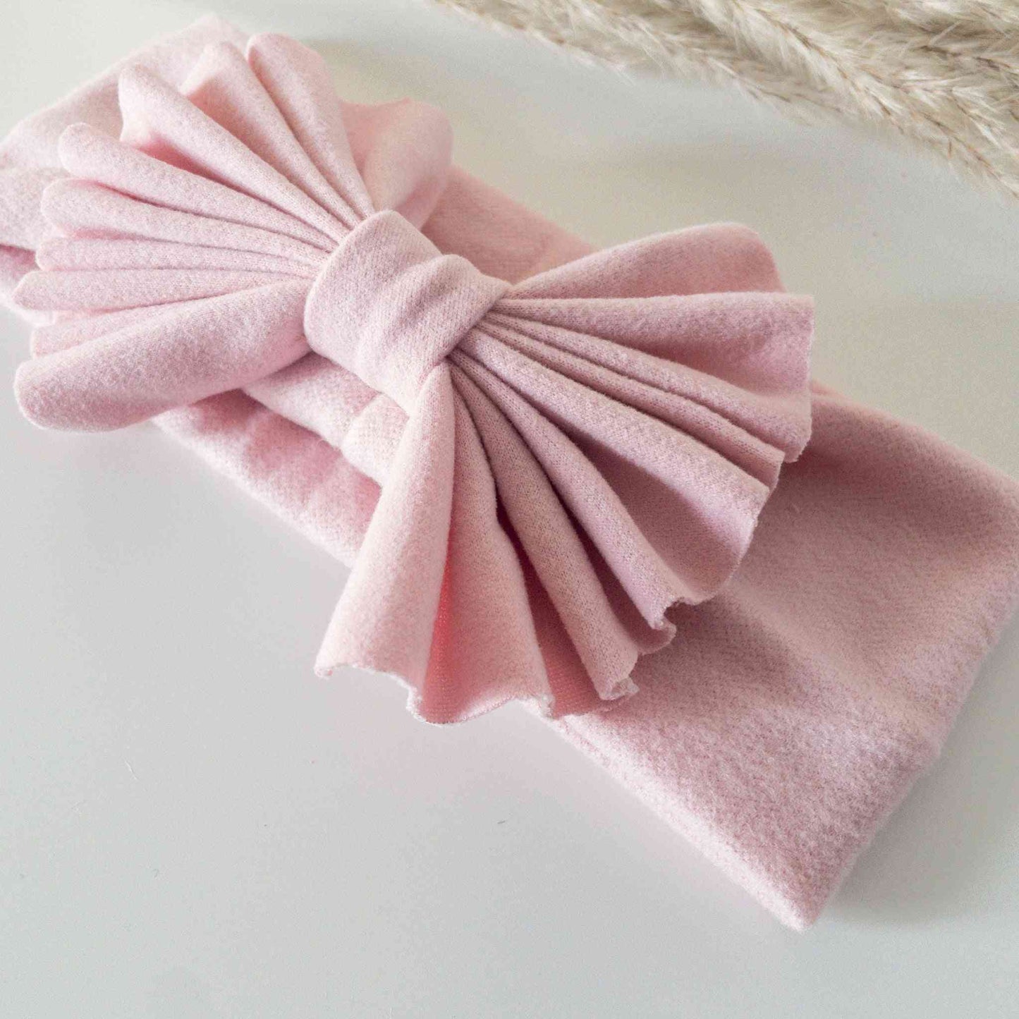 Fascia in morbido cotone stretch rosa taglia unica 0-3 anni con grande fiocco