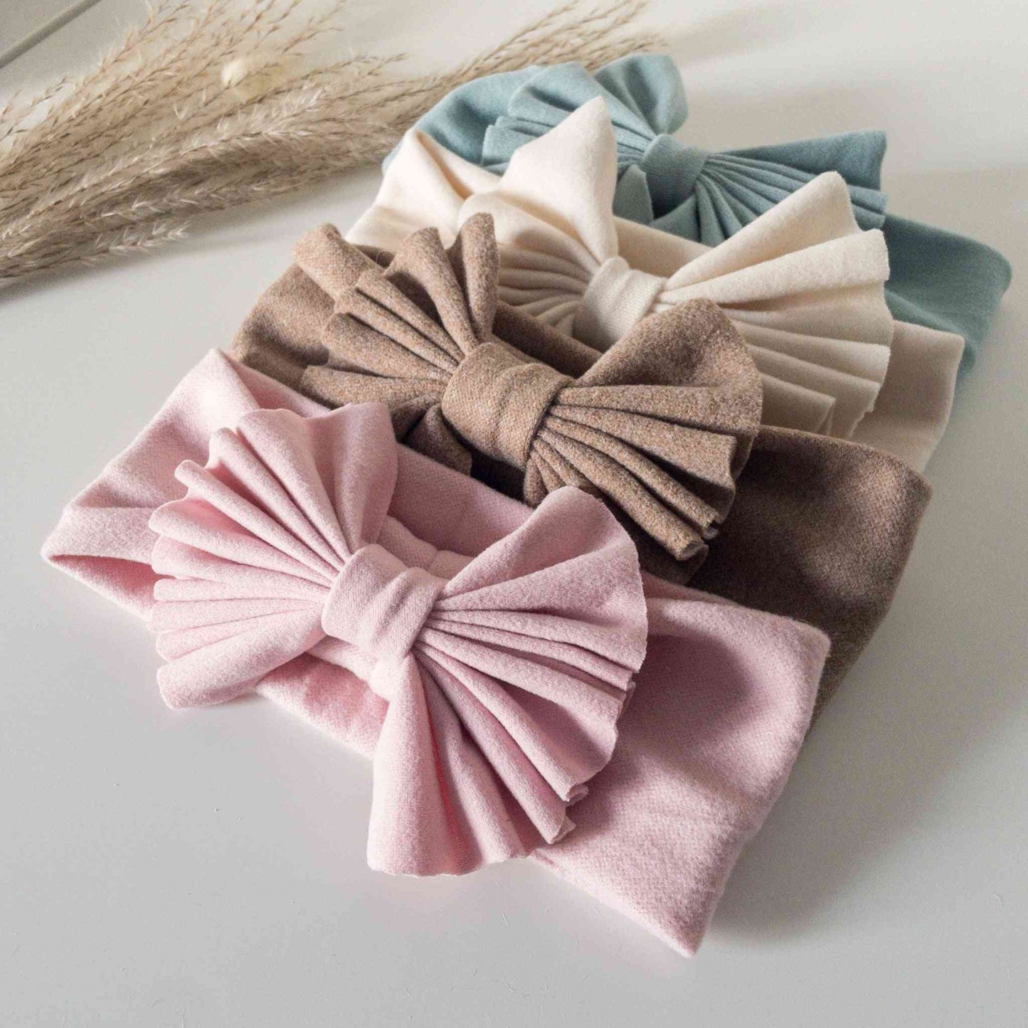 Fascia in morbido cotone stretch taglia unica 0-3 anni con grande fiocco