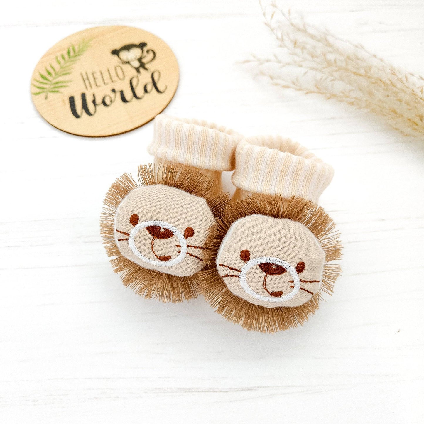 calzini cotone beige con risvolto con testa applique testa di leone taglia 0-6 mesi neonato