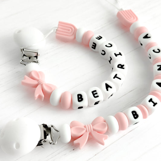 Catenella portaciuccio rosa e bianca con nome personalizzato per neonate