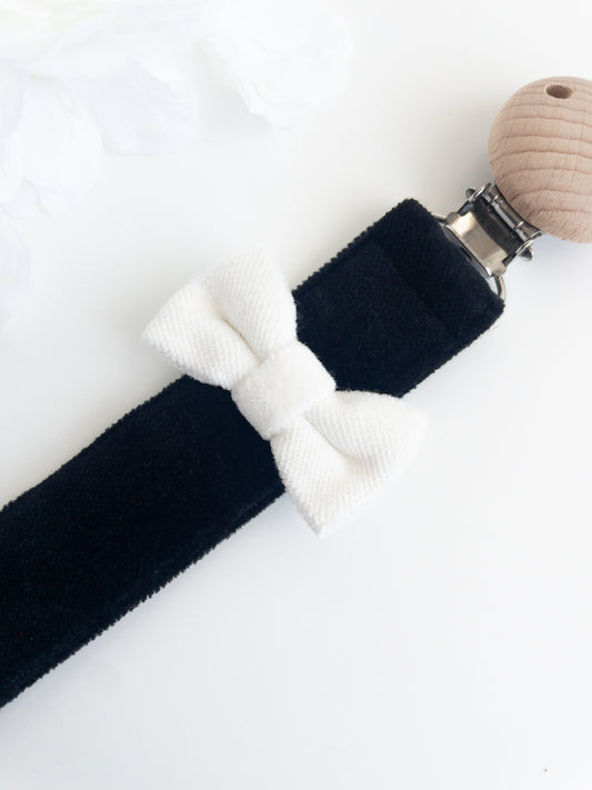 Elegant pacifier chain with black and white bow