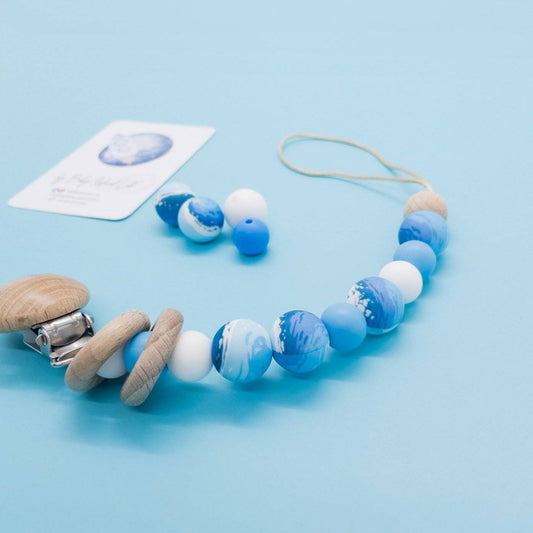 Porta ciuccio per neonato con perle blu e bianche in silicone e legno, ispirazione spazio e pianeti