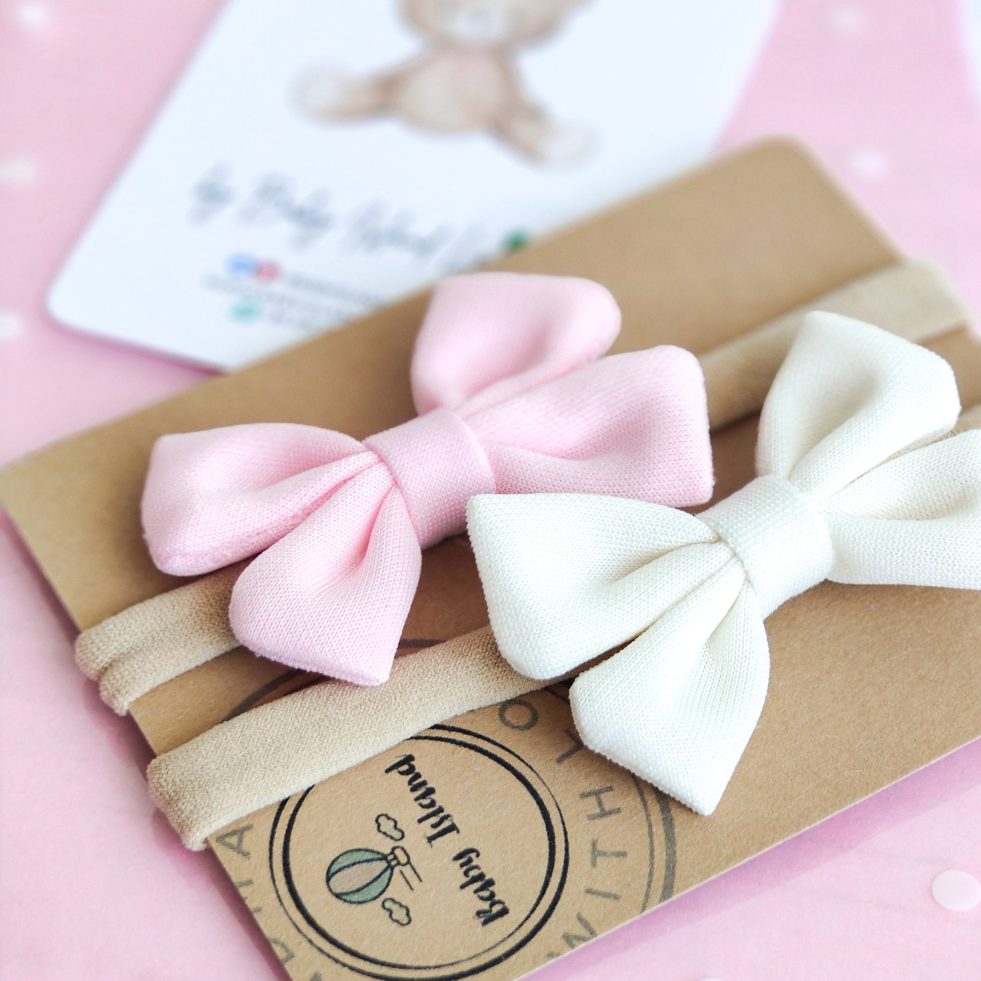 fasce neonata con fiocco espandibili nylon rosa e bianco