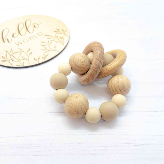 massaggiagengive ad anello colori neutri in legno naturale di faggio e silicone alimentare, anello massaggiagengive beige