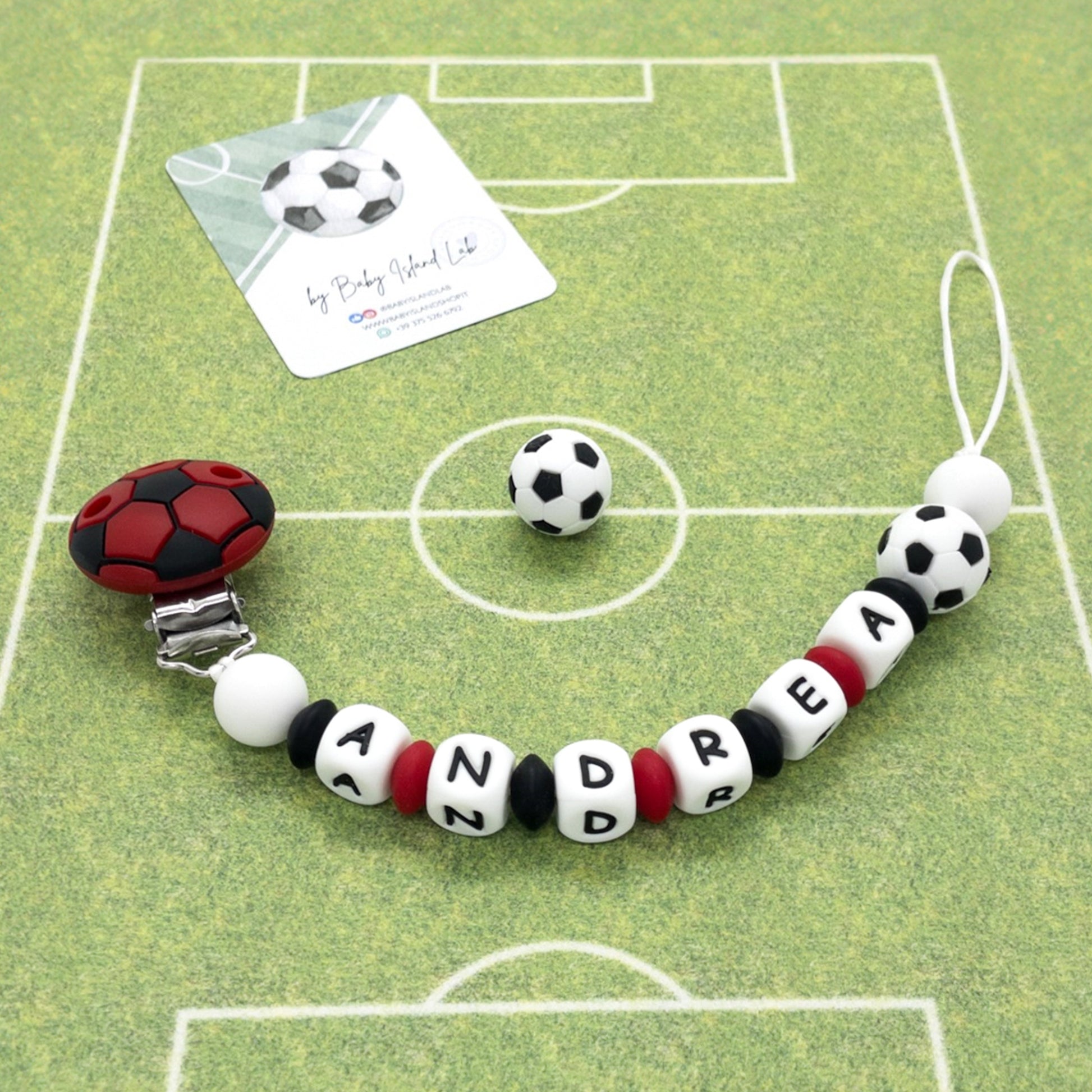 Catenella porta ciuccio milan rosso nero personalizzata con nome in silicone alimentare con clip e perlina a forma di pallone da calcio