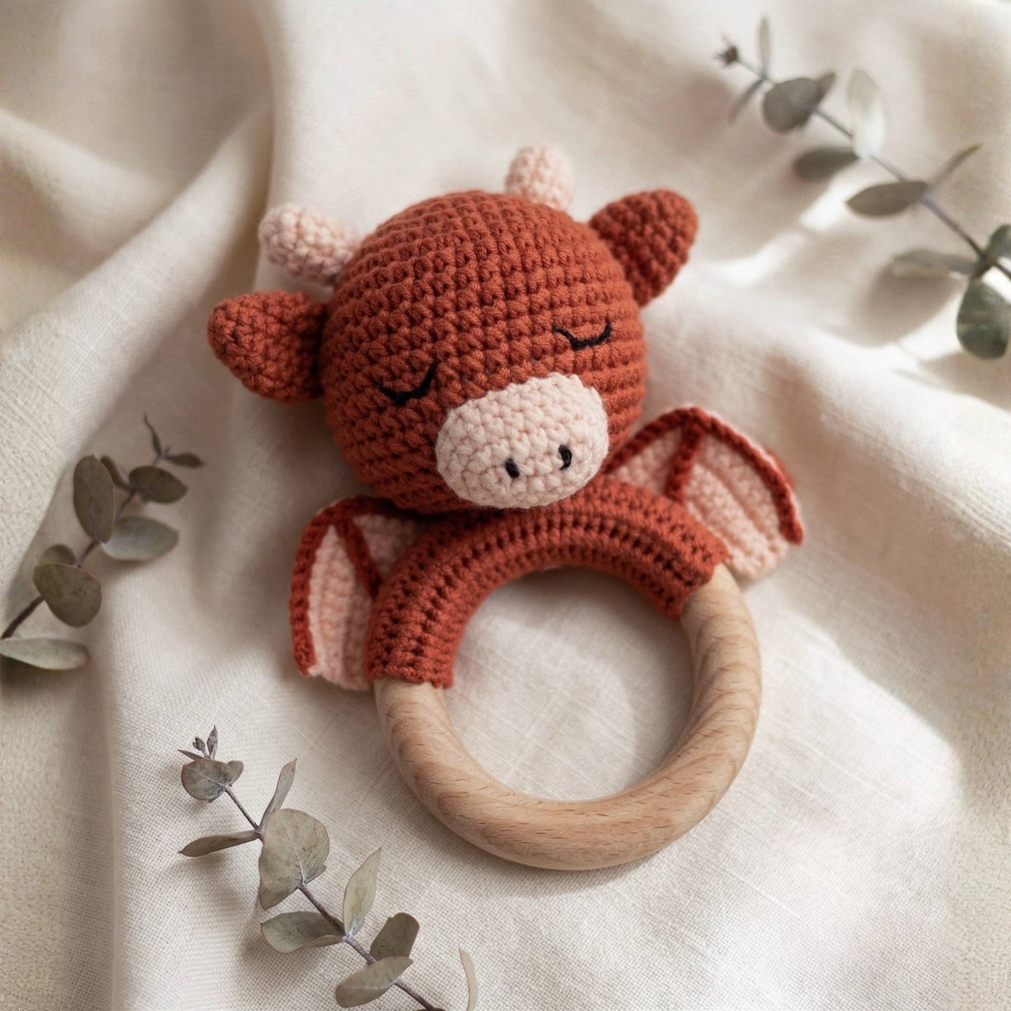 Baby dragon rattle with wooden ring